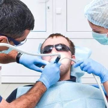 Man Having Oral Cancer Screening | Milestone Family Dentistry